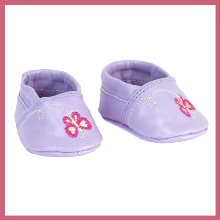 gray suede slipons for baby dolls is shown