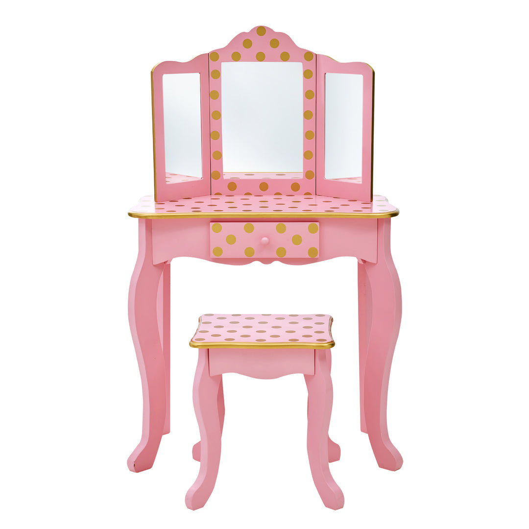A kid's vanity table and matching stool in pink with gold polka dots
