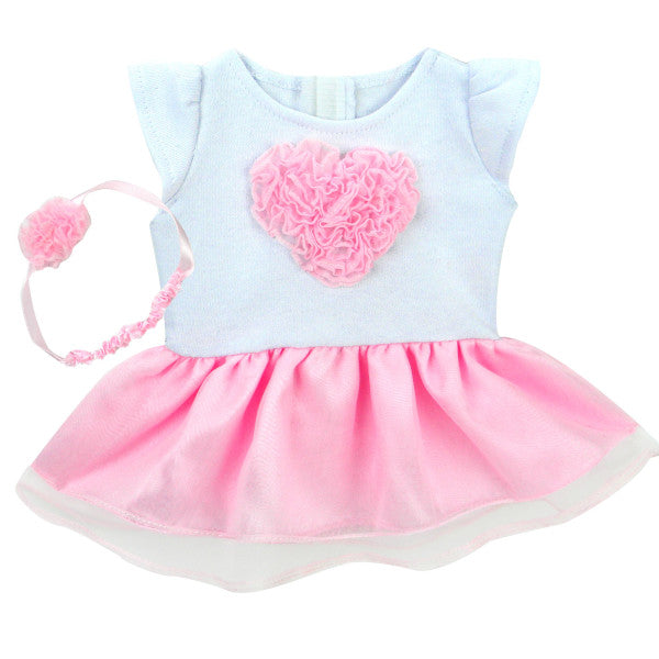 A white capped sleeved dress with a pink tulle heart and skirt and matching headband.