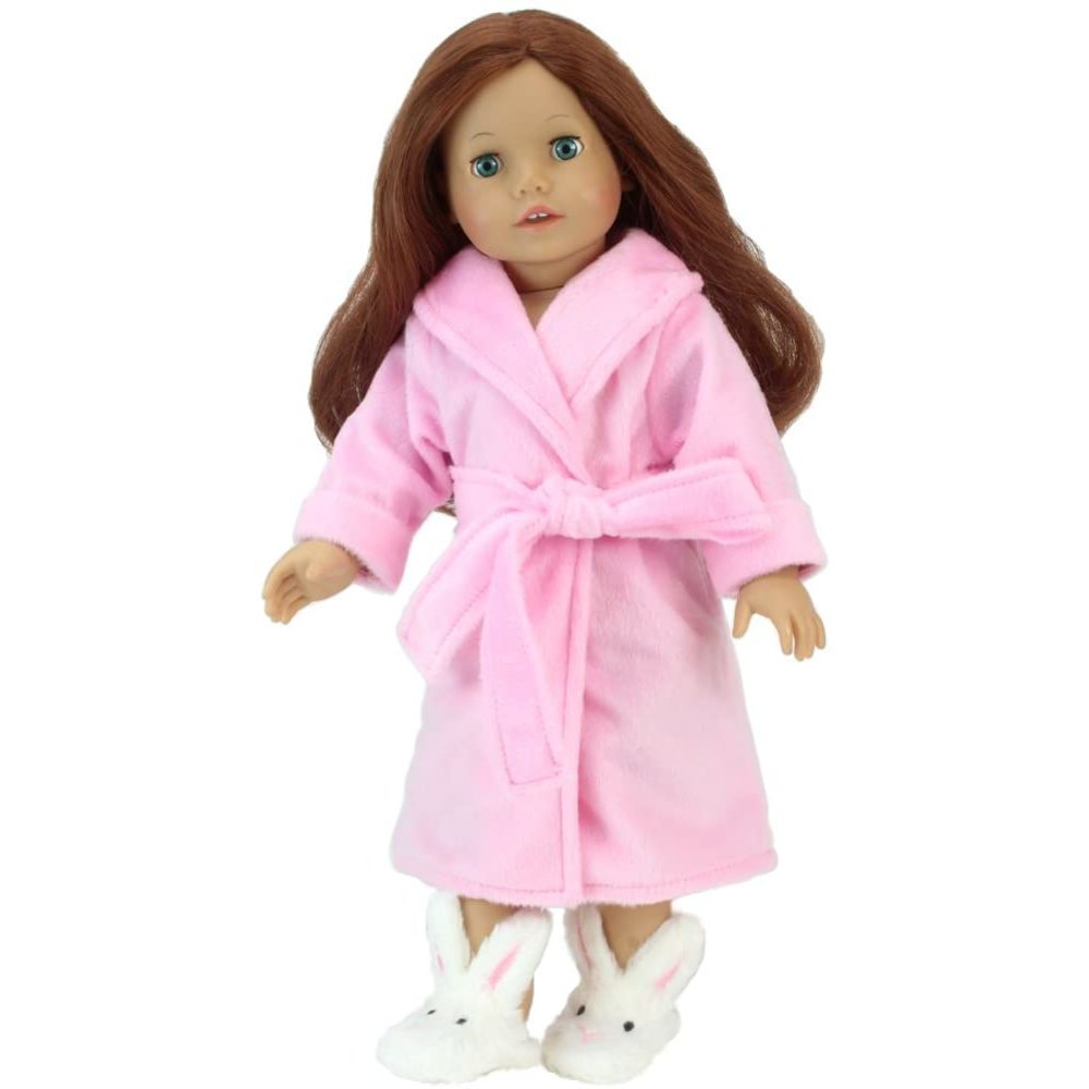 An auburn-haired 18" doll with a pink terry cloth robe and fuzzy bunny slippers.